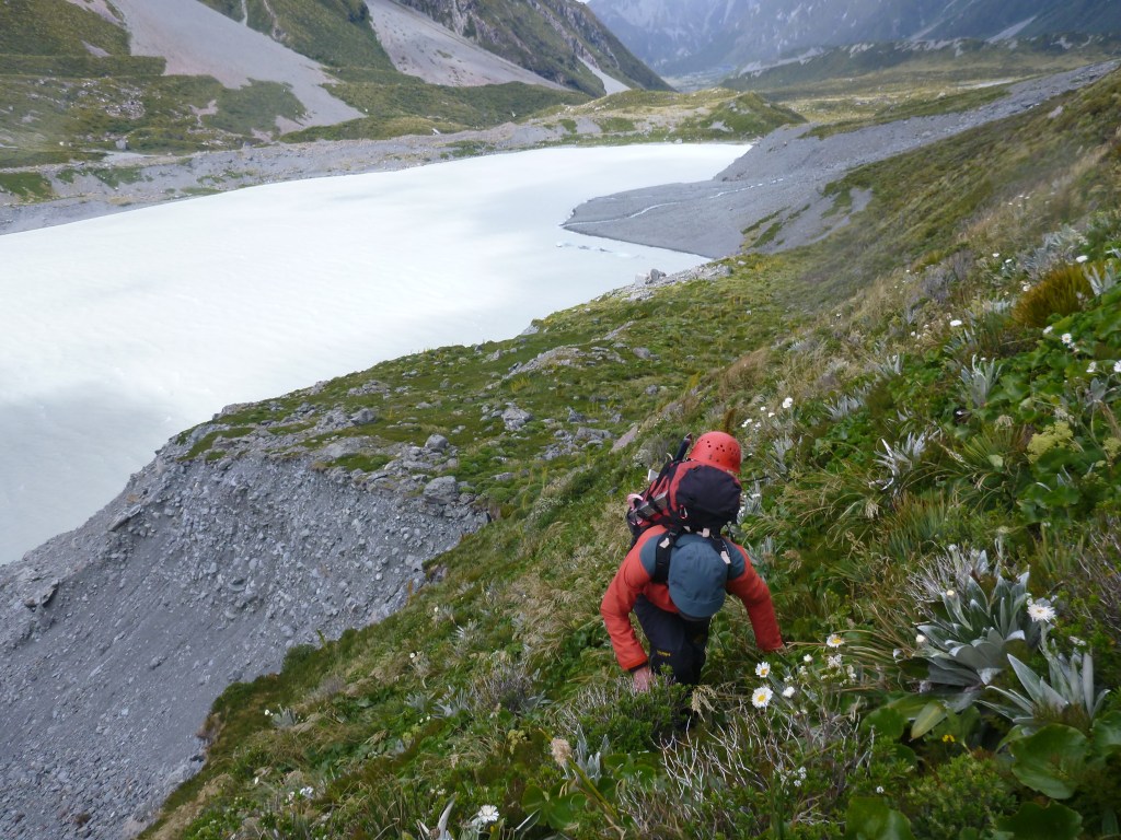 Alan Silva heading up above the moraine bluffs above the Hooker lake.