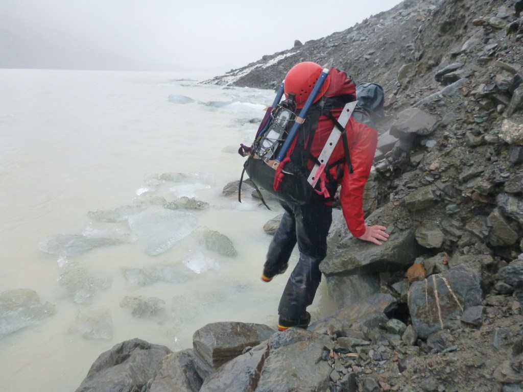 Alan Silva scrambling around the Hooke lake shore. This took 1.5 hours and was tough work but faster than trying to traverse up higher up the steep moraine.