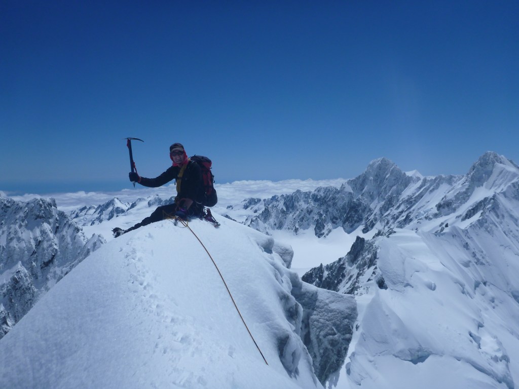 Alan Silva enjoying the view from the summit of Mt Dixon