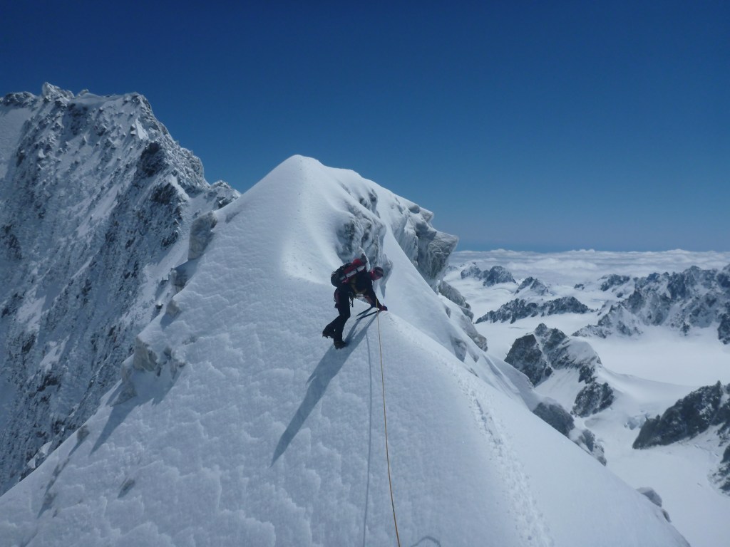 Alan Silva works his way up the final summit ridge on Mt Dixon