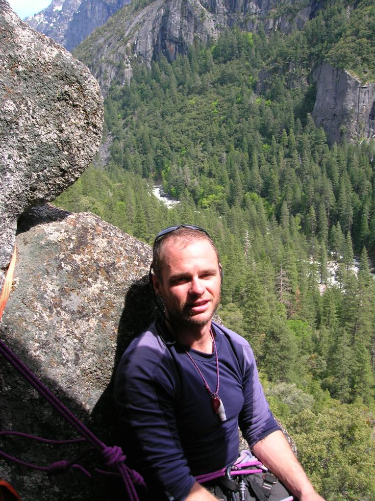 Relaxing on a belay station on 'inner reaches'. Glorious view of the valley.