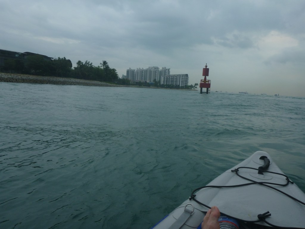 Sentosa Cove in the distance on the left hand side.