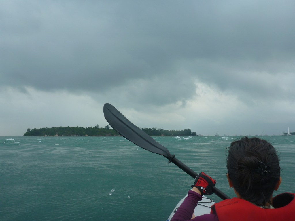 That white water just infront of the boat is a sign of two different current streams meeting. Was hard work paddling through this and it filled the boat up with water.