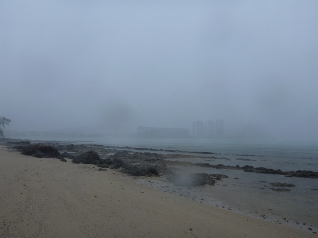 The view across the straight to Sentosa Island from Tekukor Island in the pouring rain. You can see how the visibility dropped and made it dangerous to paddle amongst the high speed ferries.