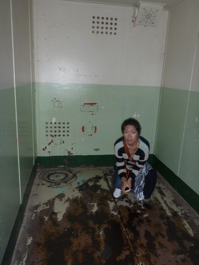 Stephanie loving being in a solitary confinement cell on Alcatraz.