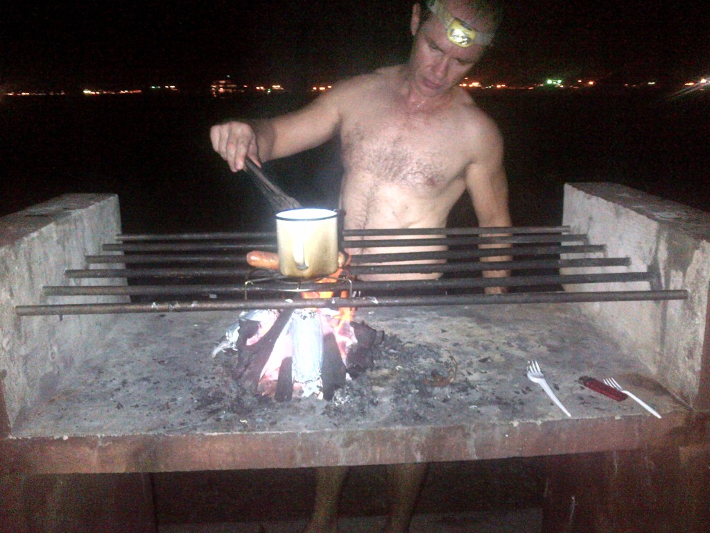 Cooking some noodles and sausages over the BBQ