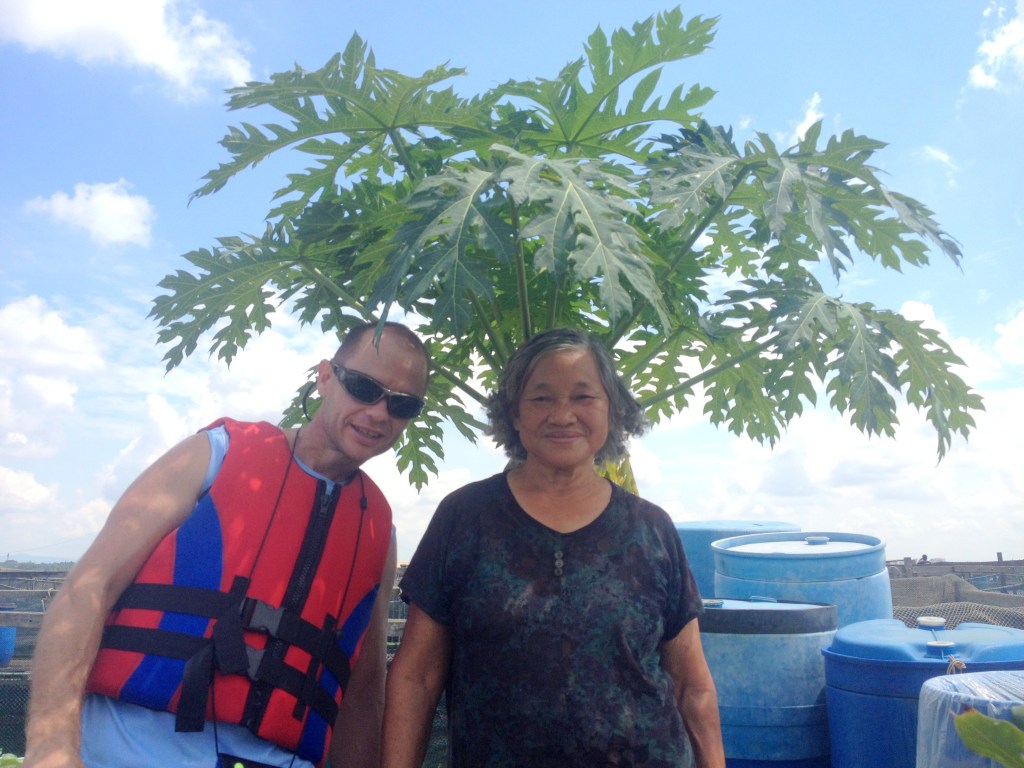 With Mr Ang's Uncle's wife in her garden.