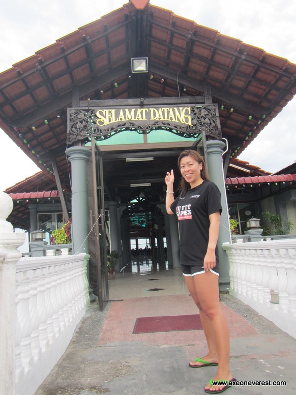 Stephanie outside the front entrance - 'Selamat Datang' means 'Welcome' in Malay.
