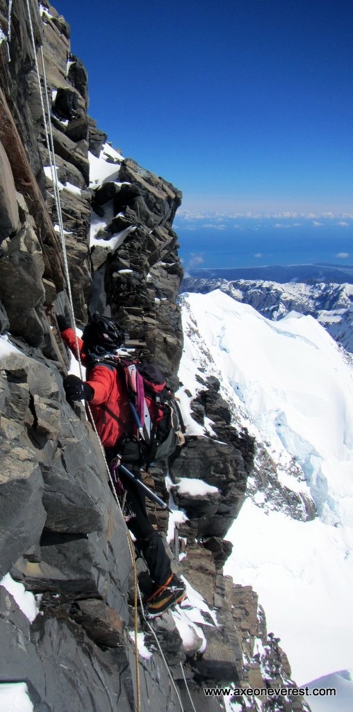 Alan Silva climbs the summit rocks on Aoraki Mt Cook.